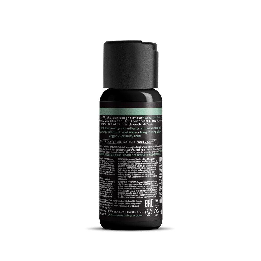 Bottle of Wicked Sensual Massage Oil in Honeysuckle + Ivy scent