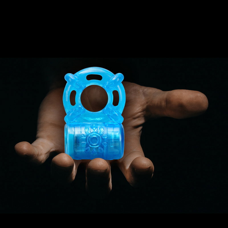 Blush Stay Hard rechargeable 5-function vibrating cock ring in blue with ribbed front texture