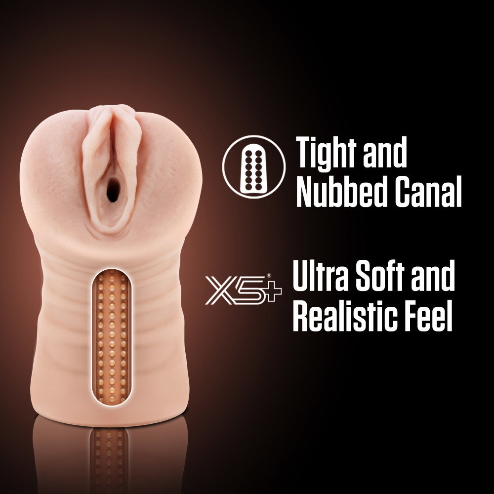 EnLust Ayumi vibrating stroker in flesh colour, a compact open-ended masturbator with textured interior