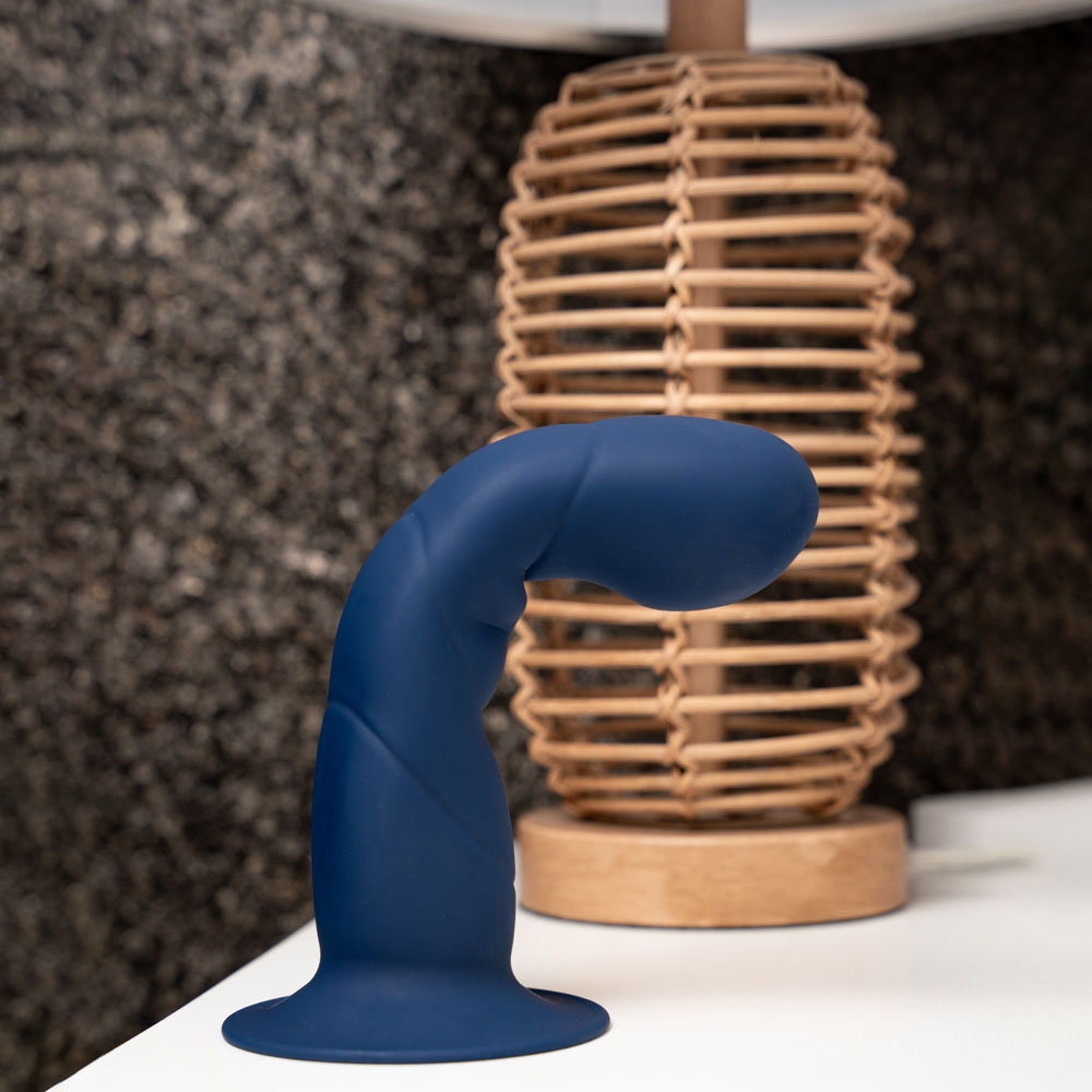 Maia Marin 8 inch blue silicone dildo with curved posable shaft and suction cup base