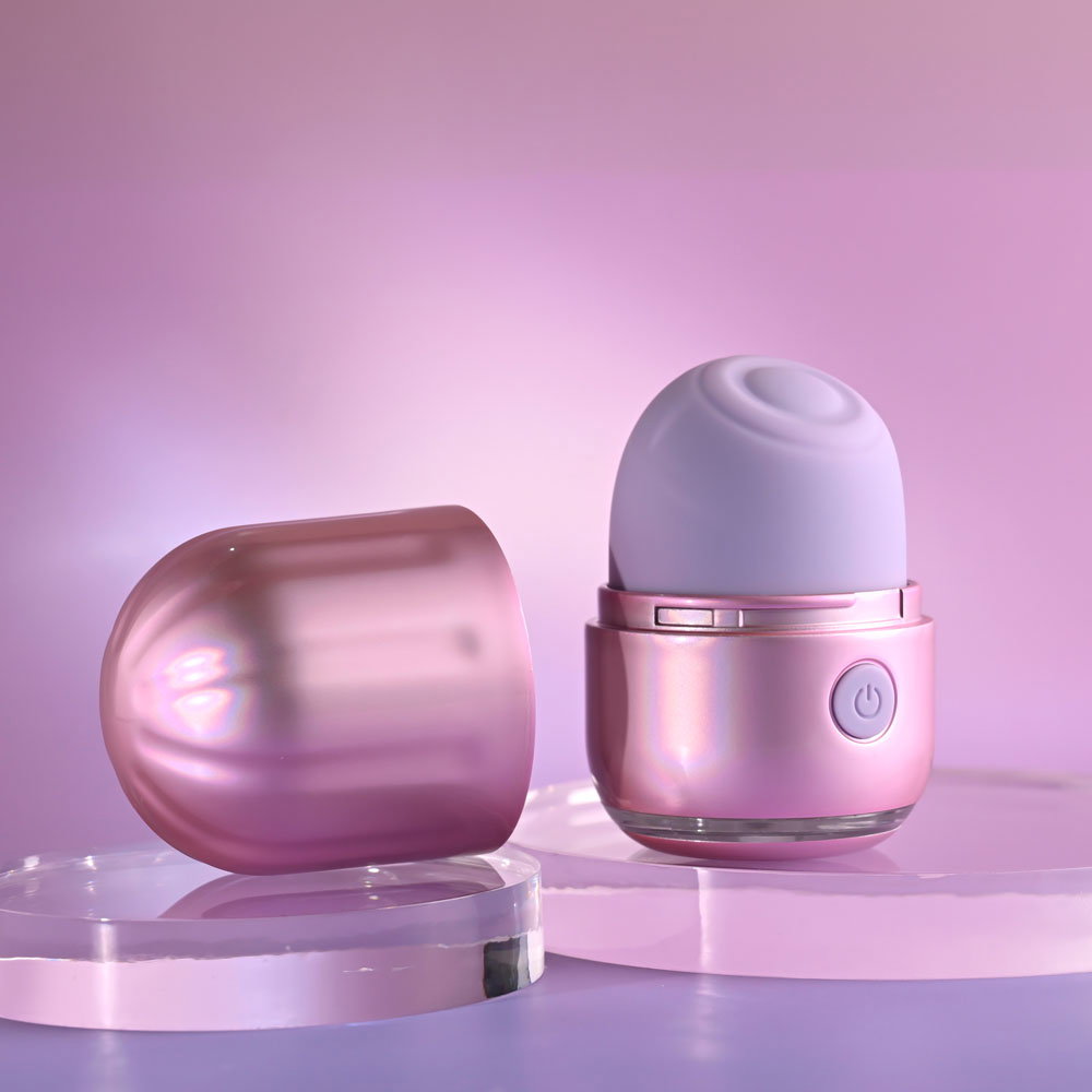 Evolved Vacation Vibes tapping stimulator, pink-pearl iridescent canister-style toy with silicone head