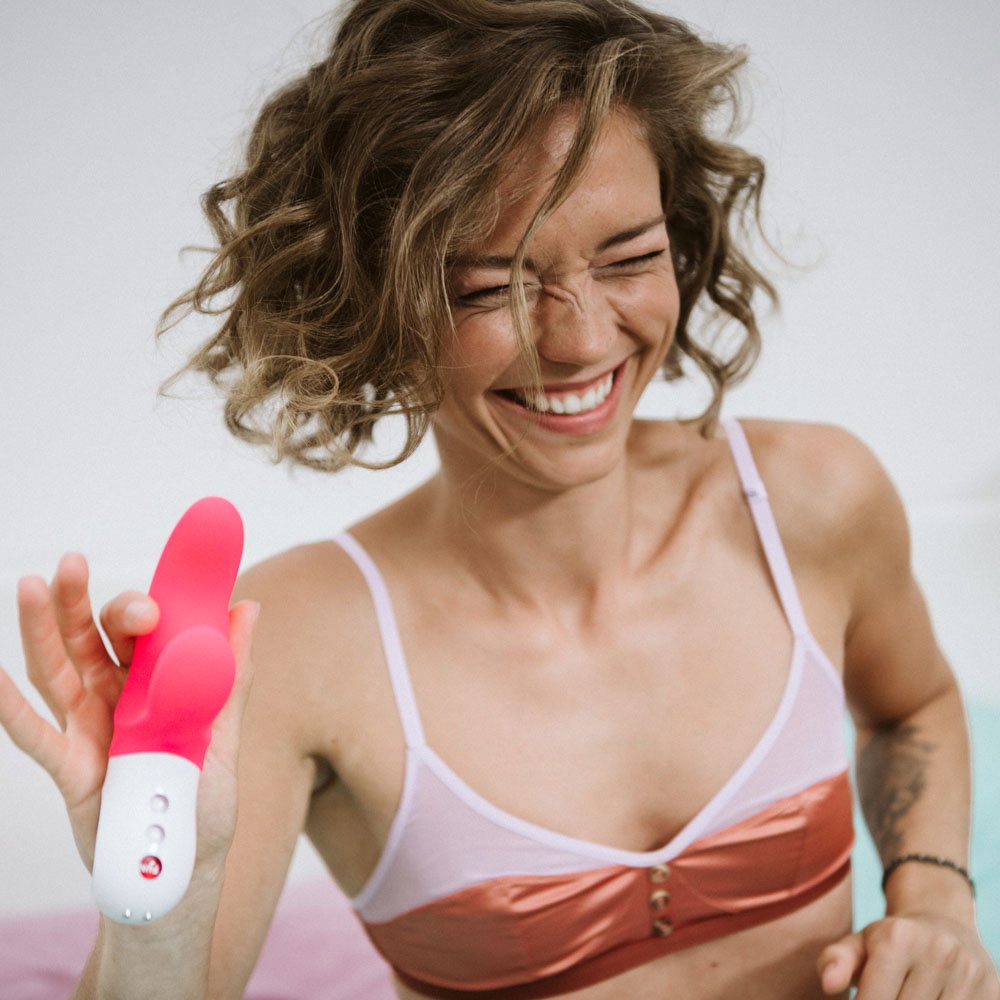 Fun Factory MISS BI rabbit vibrator in pink and white with curved shaft and external arm