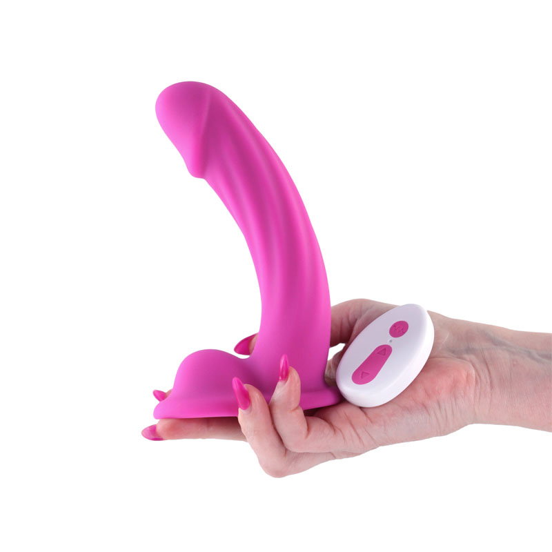 Pink curved silicone vibrating dong, 6 inch, with textured shaft and wireless remote control