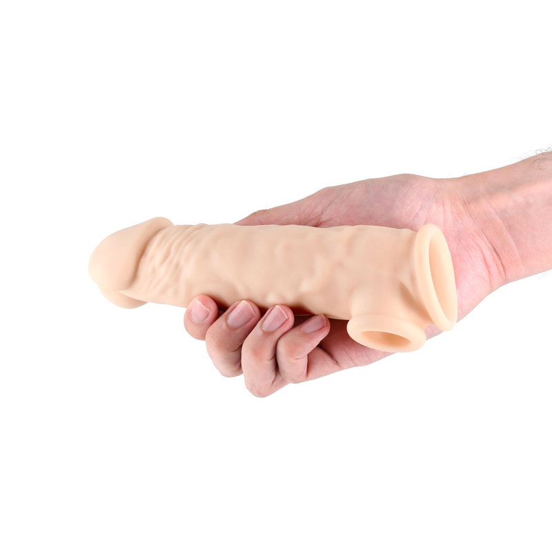 Renegade Annex Thick Sleeve in flesh colour, a textured liquid silicone penis sleeve with ball-drop design
