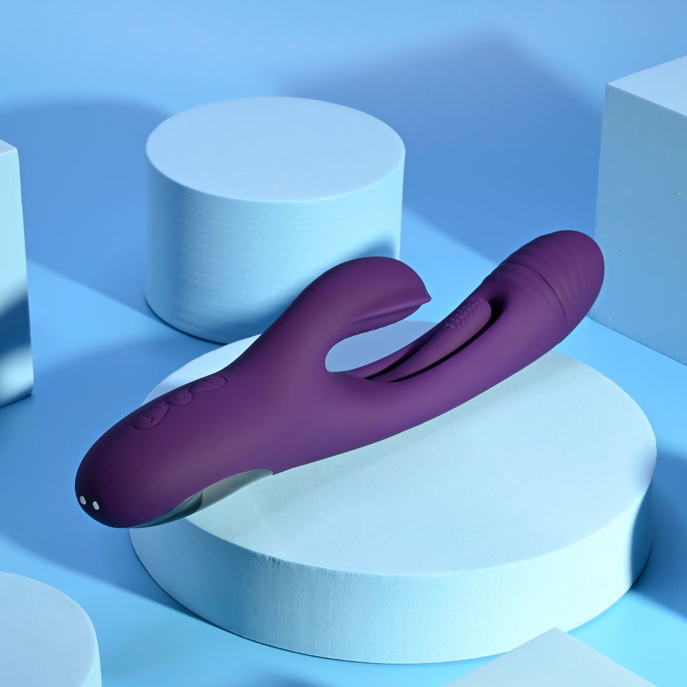 Playboy Pleasure The Thrill silicone rabbit vibrator with textured head and external stimulator