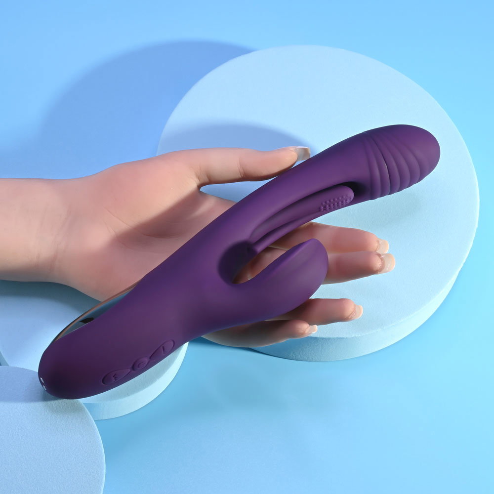 Playboy Pleasure The Thrill silicone rabbit vibrator with textured head and external stimulator