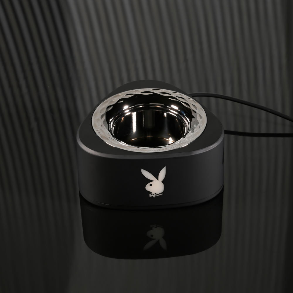 Playboy Pleasure Pleasure Zone thrusting vibrator with tapered textured head and protective case