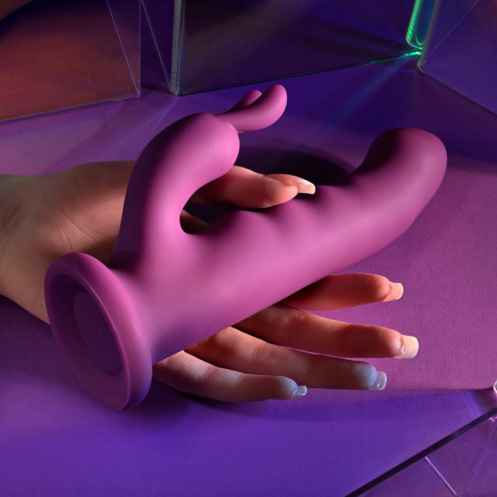 Playboy Pleasure Fluffle silicone rabbit vibrator with twirling shaft, bunny ears and suction cup base