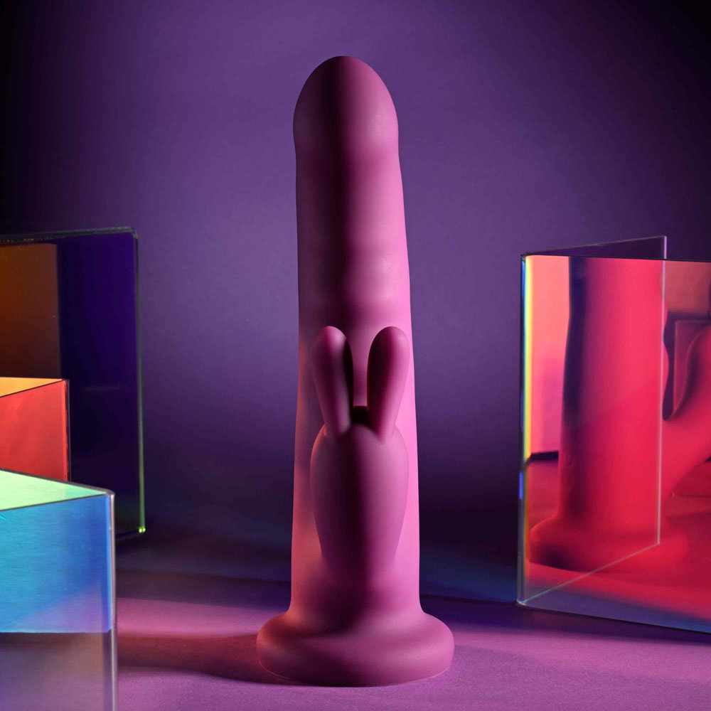 Playboy Pleasure Fluffle silicone rabbit vibrator with twirling shaft, bunny ears and suction cup base