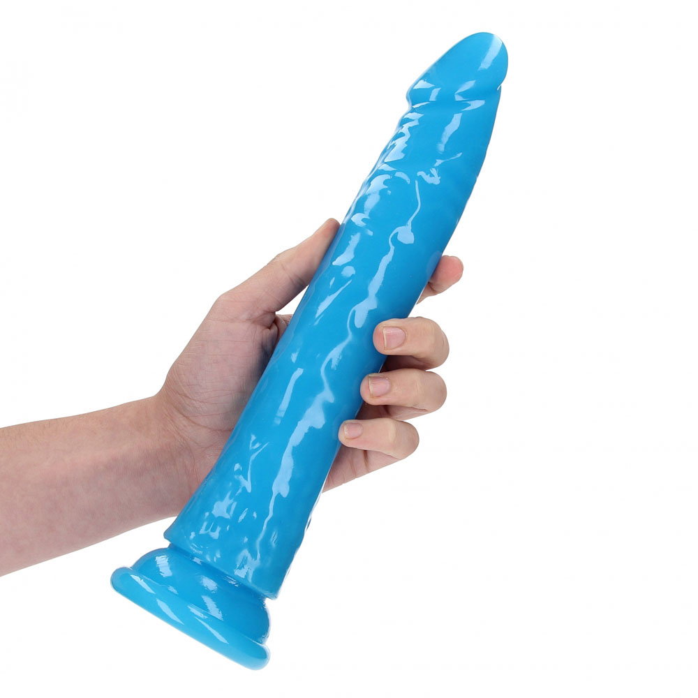 REALROCK 29 cm slim glow in the dark dildo in blue with suction cup base