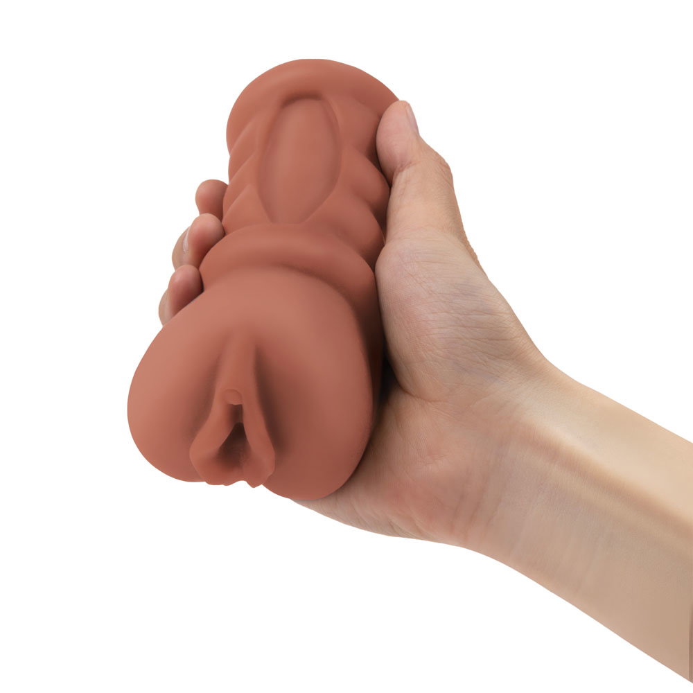 Zolo Stroke Off Latina Stroker, a compact tan-coloured handheld masturbator